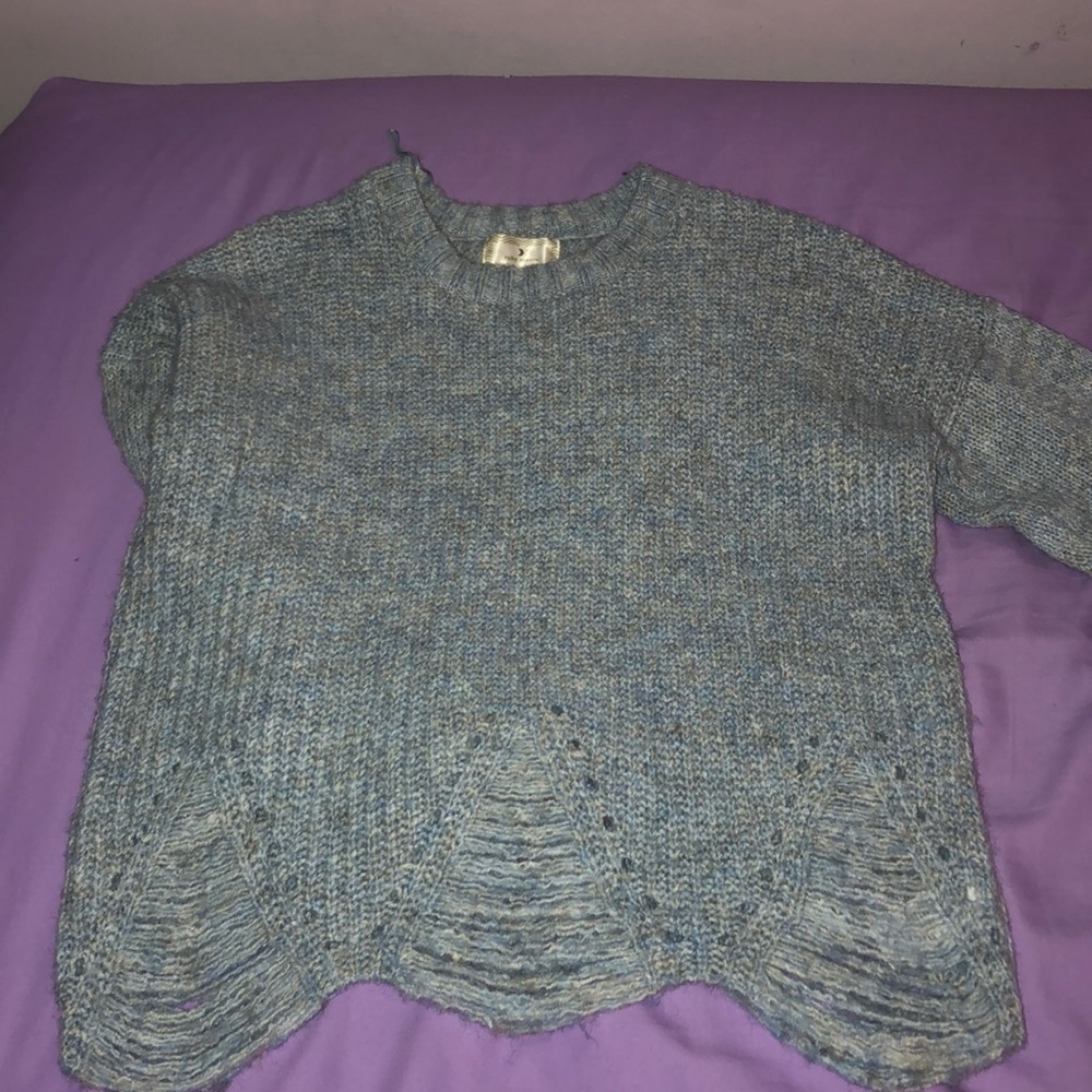 Blue distressed sweater